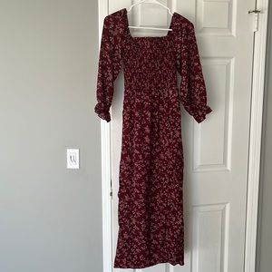 Smocked floral Midi dress with long sleeves.
